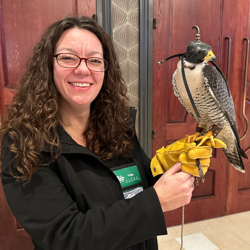 Karlie Sayer with a falcon